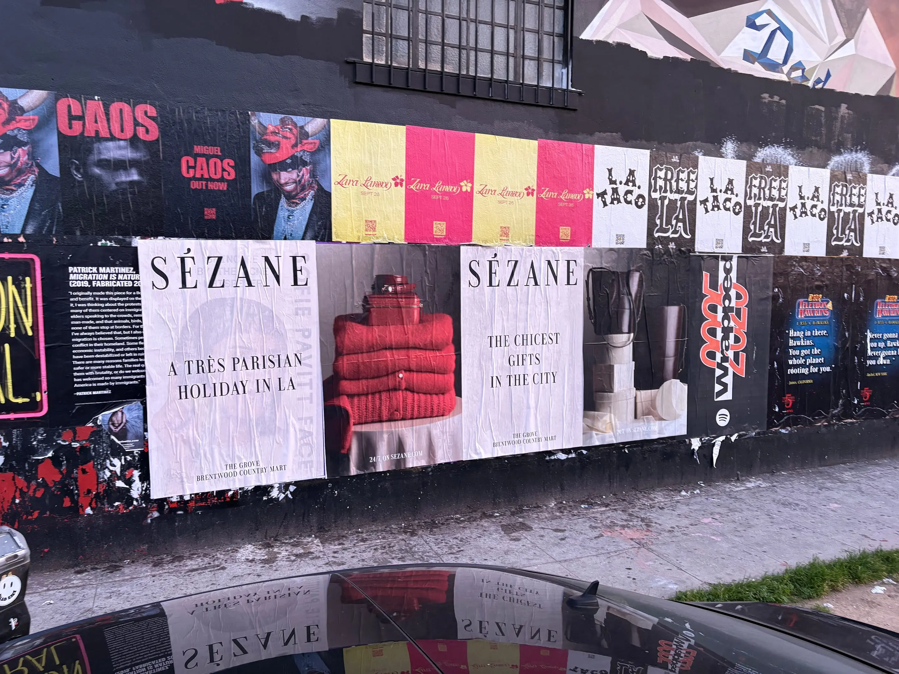 Sézane 'A Très Parisian Holiday in LA' wheatpaste campaign on Sunset Blvd, Los Angeles by Beyond Street Media