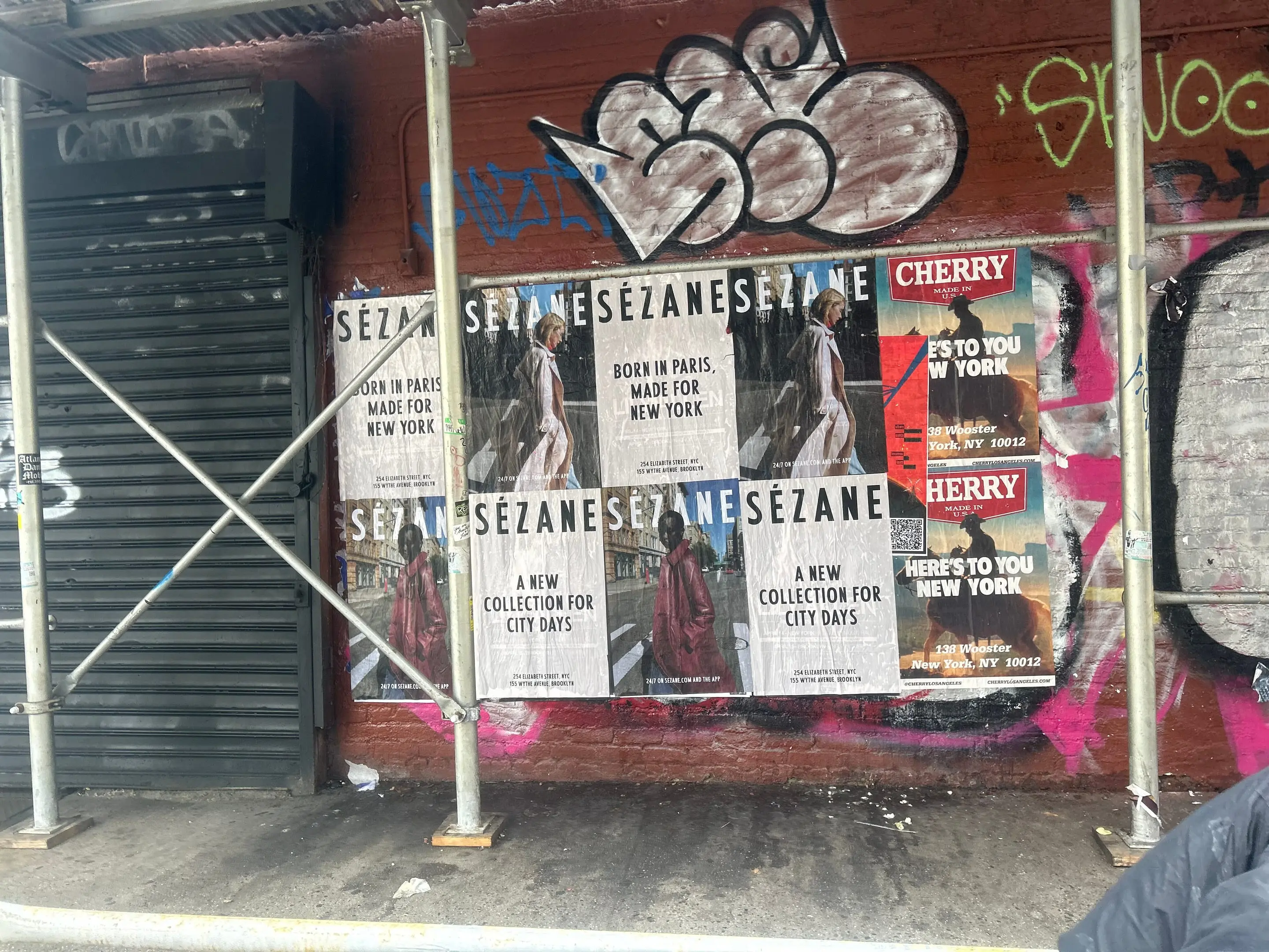 Sézane fashion brand wheatpaste campaign on scaffolding in Tribeca, New York City by Beyond Street Media