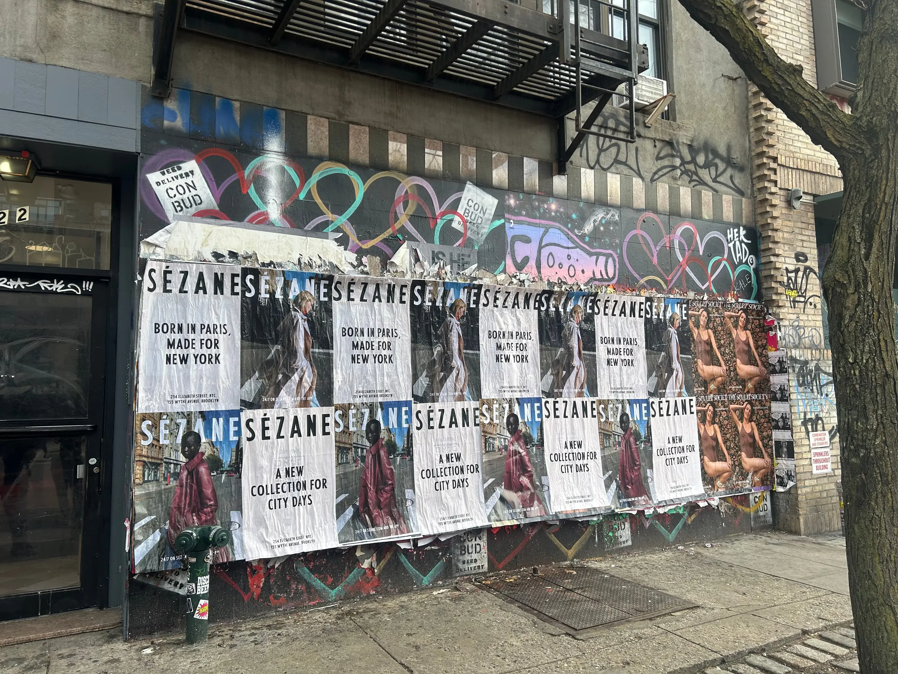 Sézane fashion brand wheatpaste campaign on scaffolding in Tribeca, New York City by Beyond Street Media