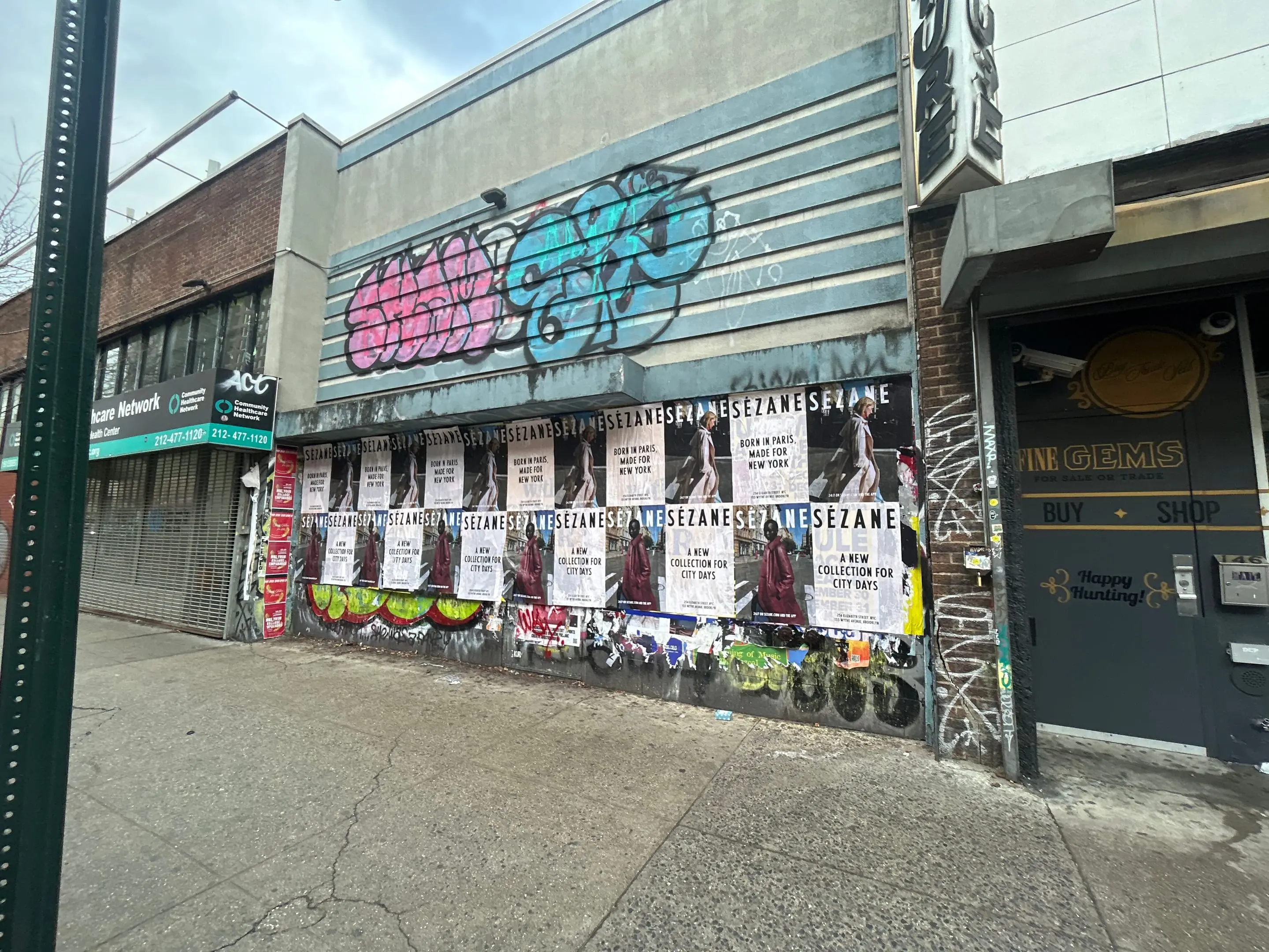 Sézane fashion brand wheatpaste campaign on scaffolding in Tribeca, New York City by Beyond Street Media