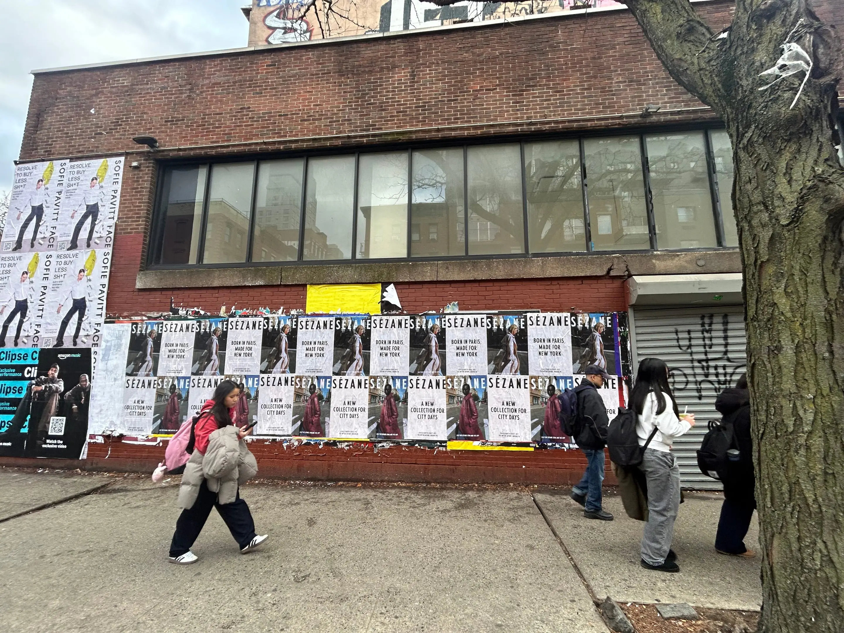 Sézane fashion brand wheatpaste campaign on scaffolding in Tribeca, New York City by Beyond Street Media