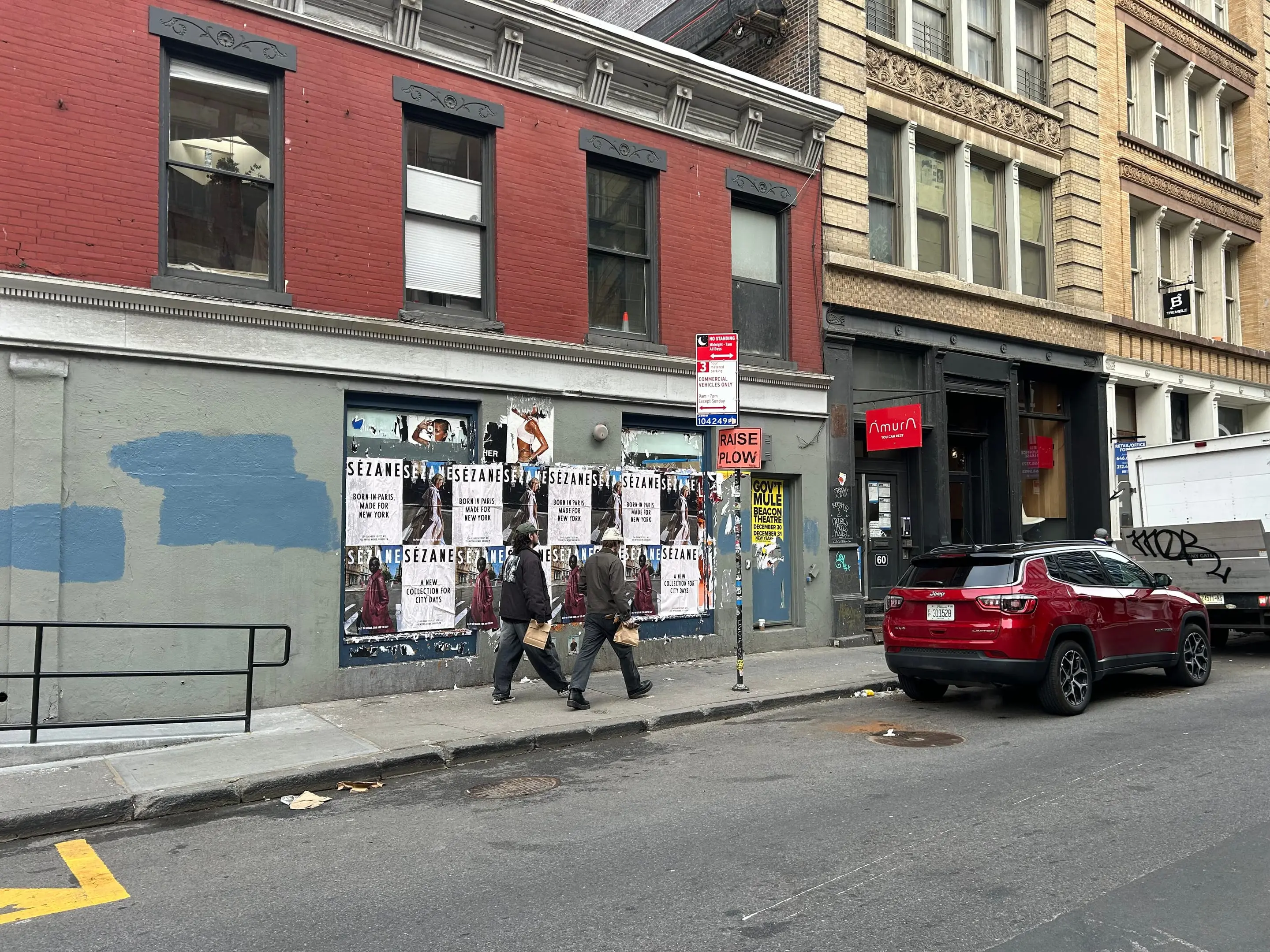 Sézane fashion brand wheatpaste campaign on scaffolding in Tribeca, New York City by Beyond Street Media