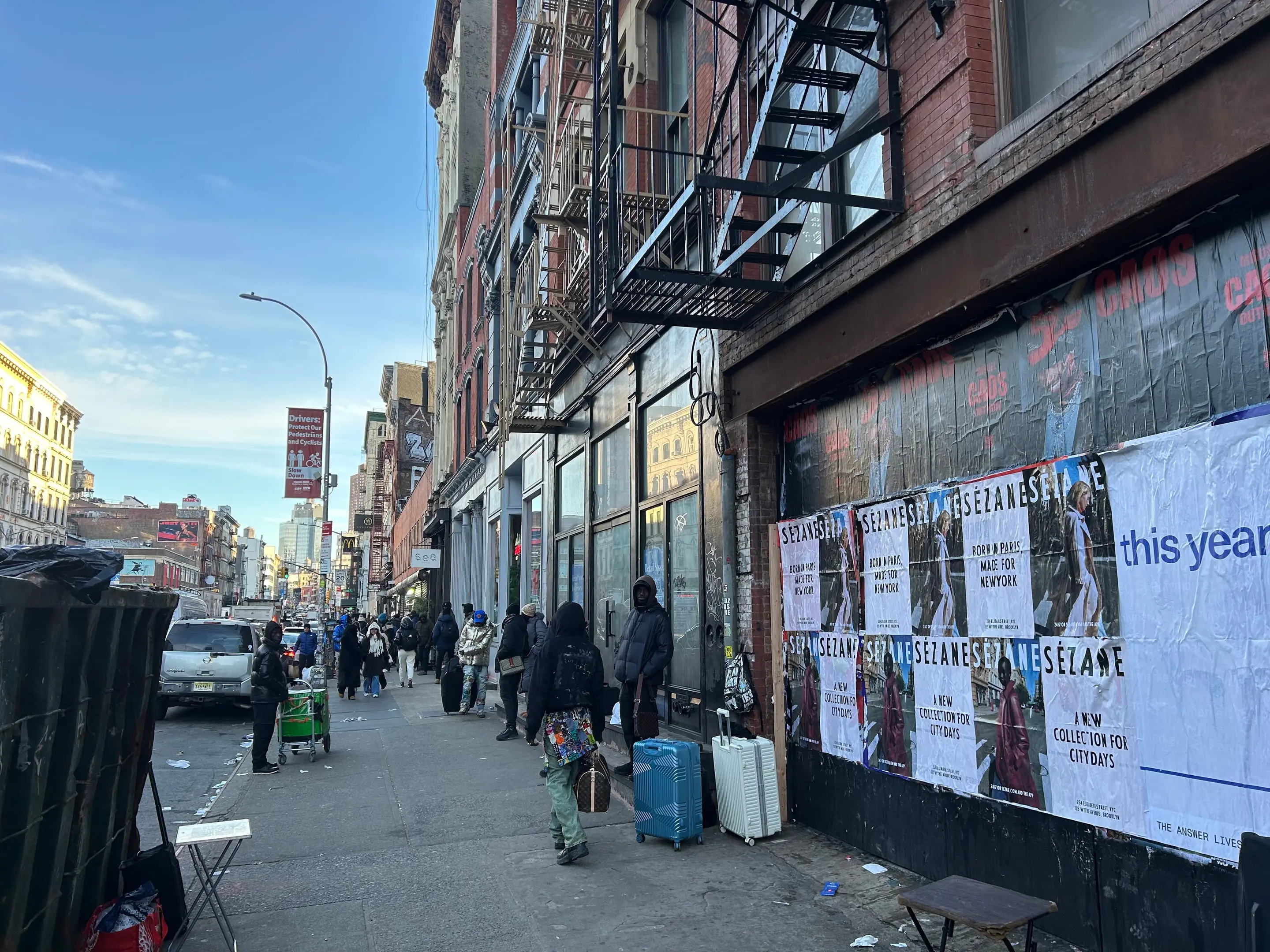 Sézane fashion brand wheatpaste campaign on scaffolding in Tribeca, New York City by Beyond Street Media