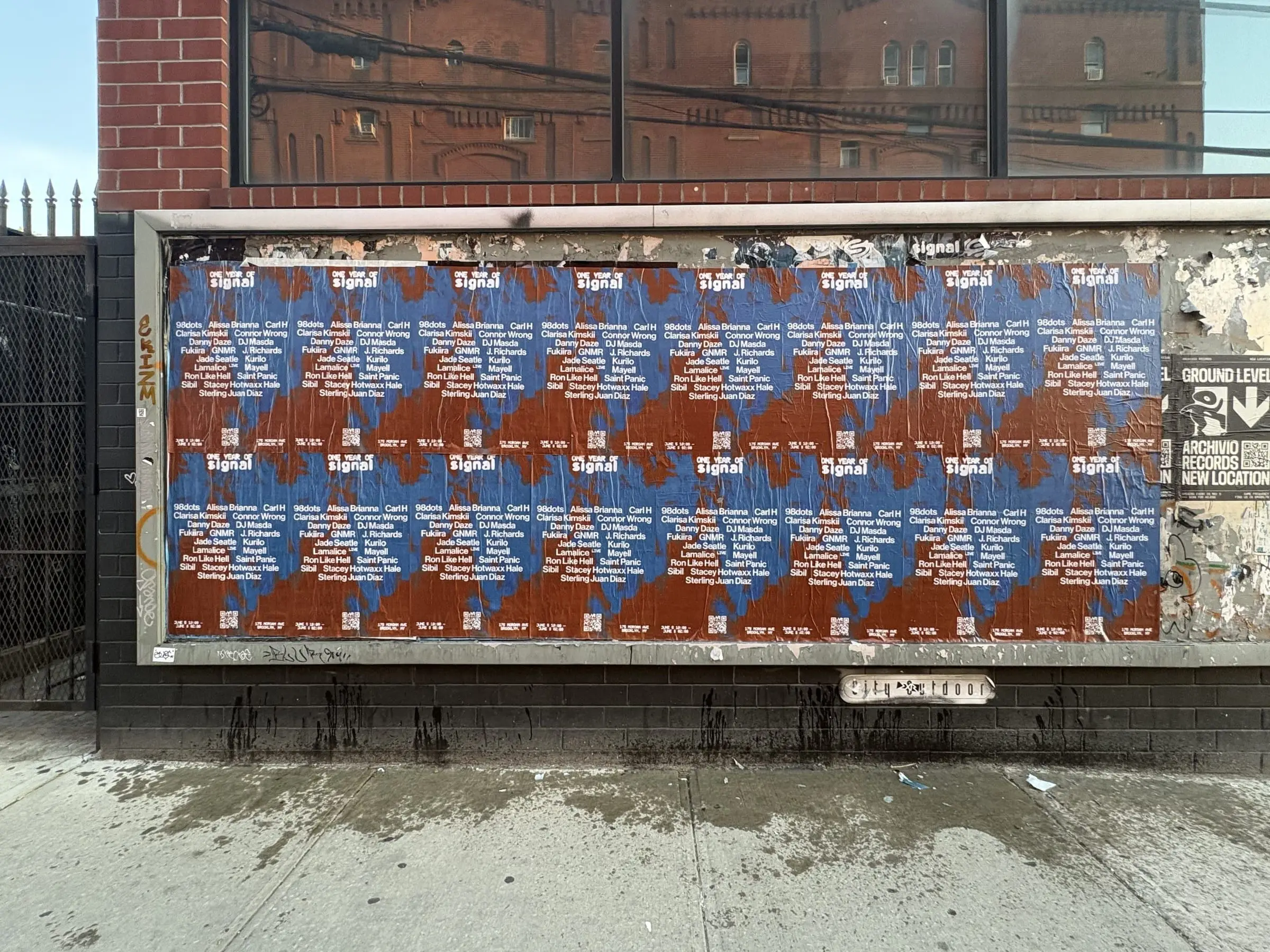 Signal nightclub 'One Year of Signal' anniversary wheatpaste wall in East Williamsburg, Brooklyn, documented street install, by Beyond Street Media