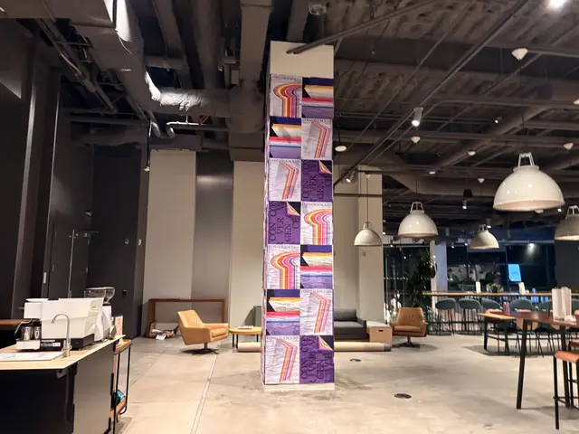Stripe Convergence interior column wrap installation at SF HQ by Beyond Street Media (photo 9 of 16).