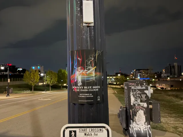 Johnny Blue Skies ashtray poster at West 18th Street, Crossroads Arts District, graffiti-tagged utility boxes at night