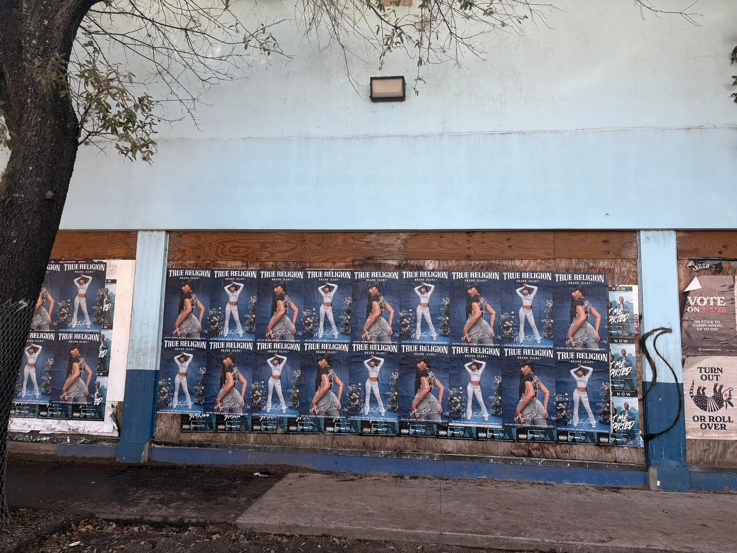 True Religion brand jeans wheatpaste poster campaign in Houston, TX by Beyond Street Media