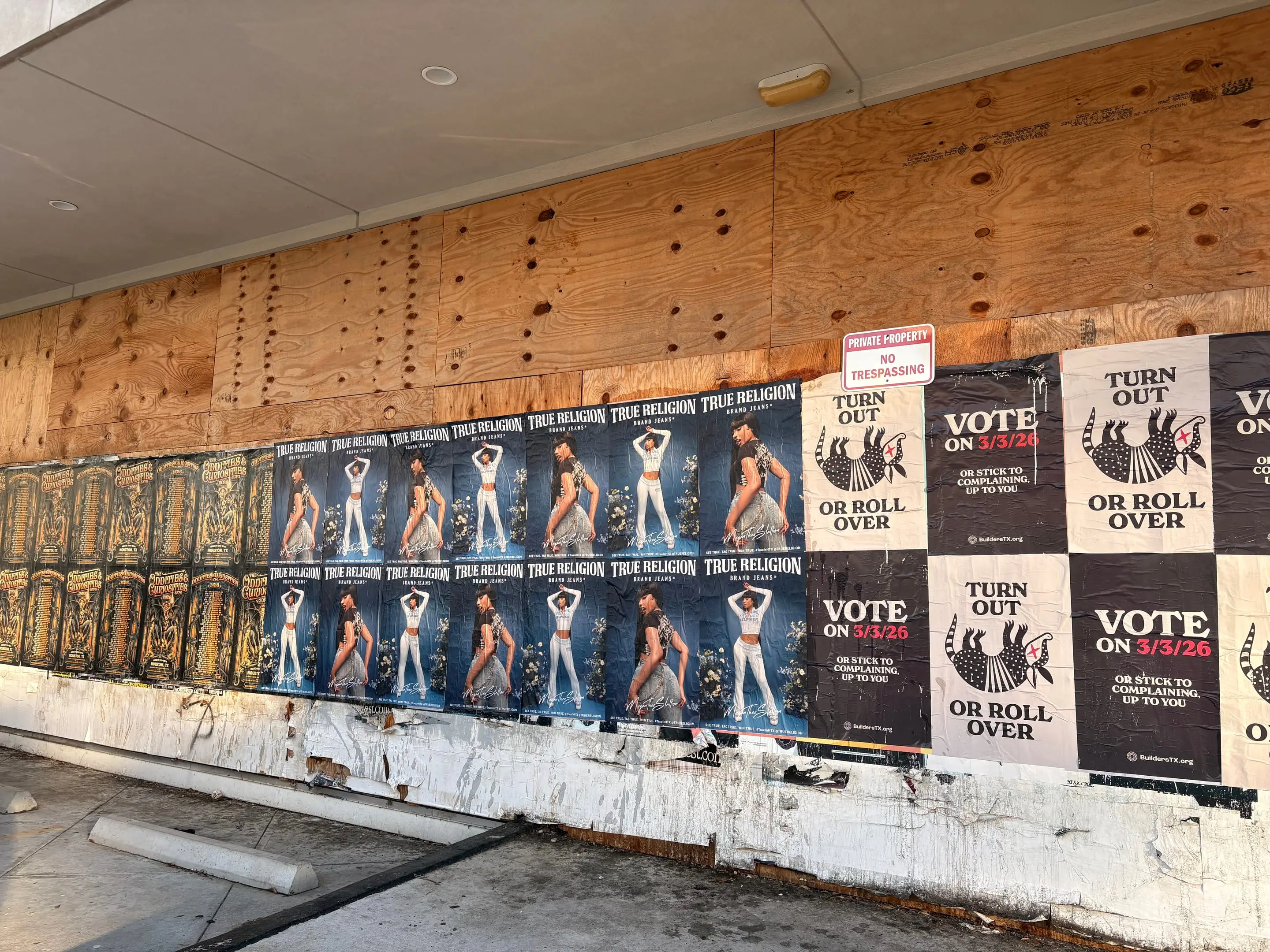 True Religion brand jeans wheatpaste poster campaign in Houston, TX by Beyond Street Media