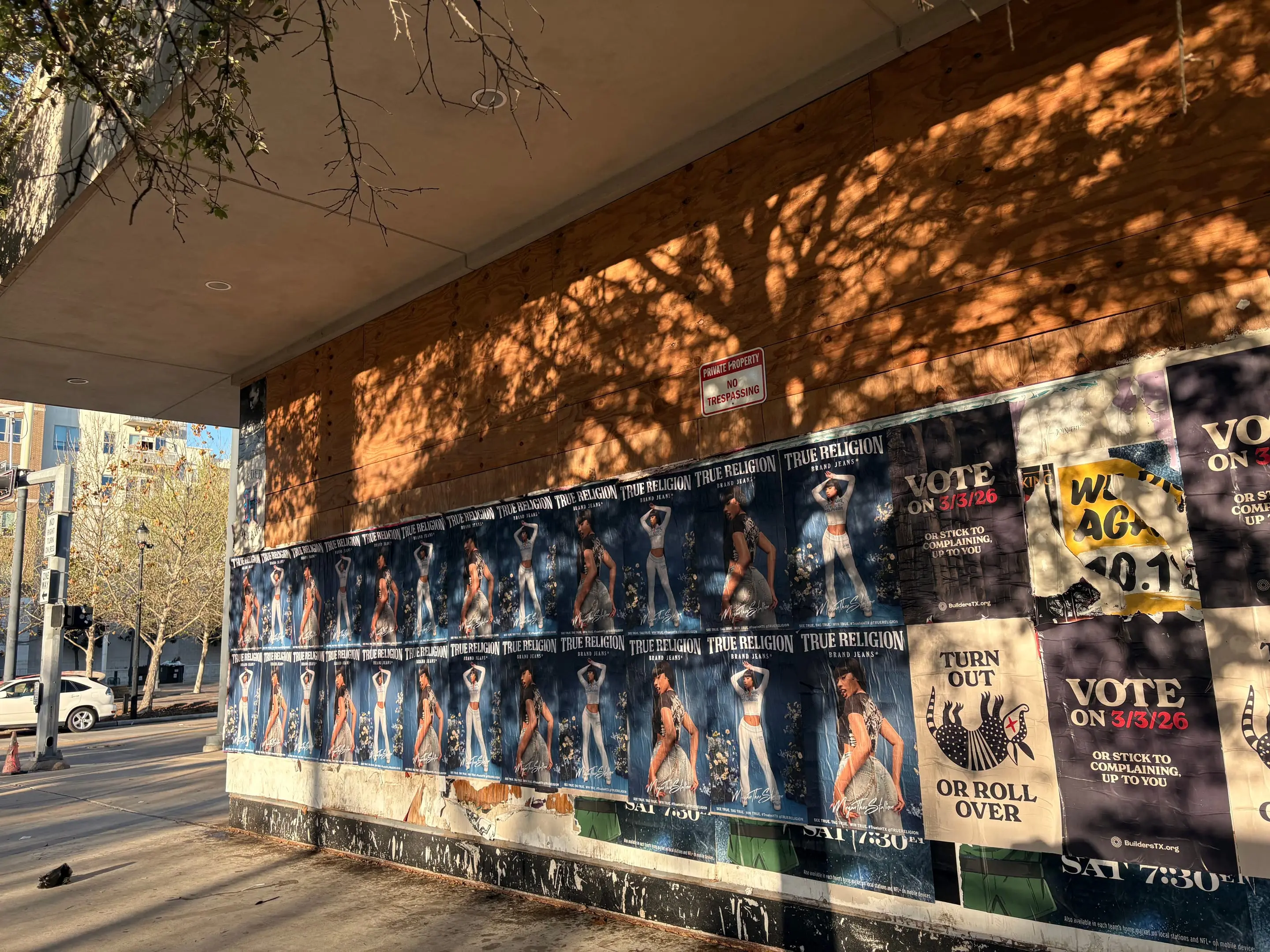 True Religion brand jeans wheatpaste poster campaign in Houston, TX by Beyond Street Media