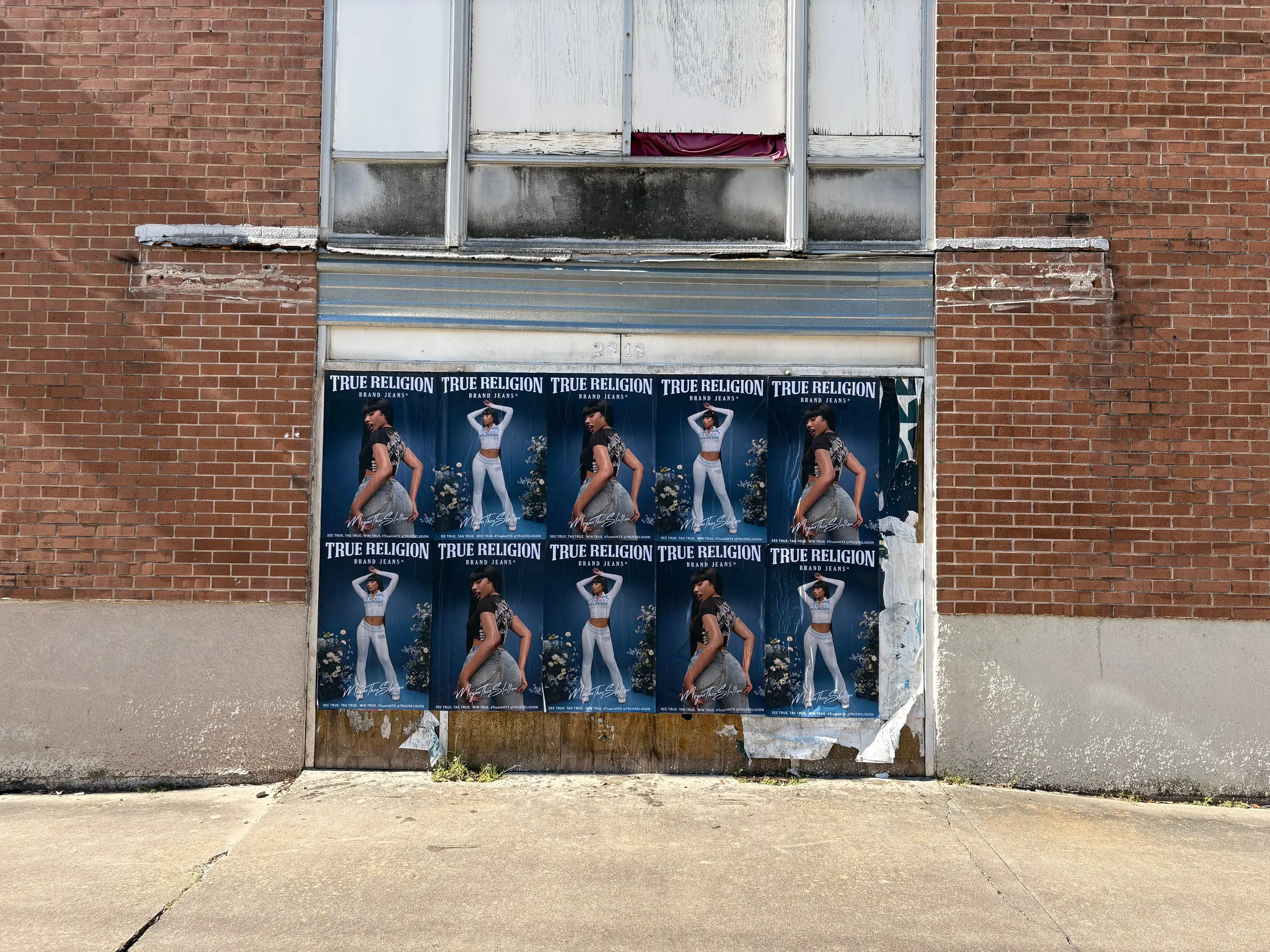 True Religion brand jeans wheatpaste poster campaign in Houston, TX by Beyond Street Media