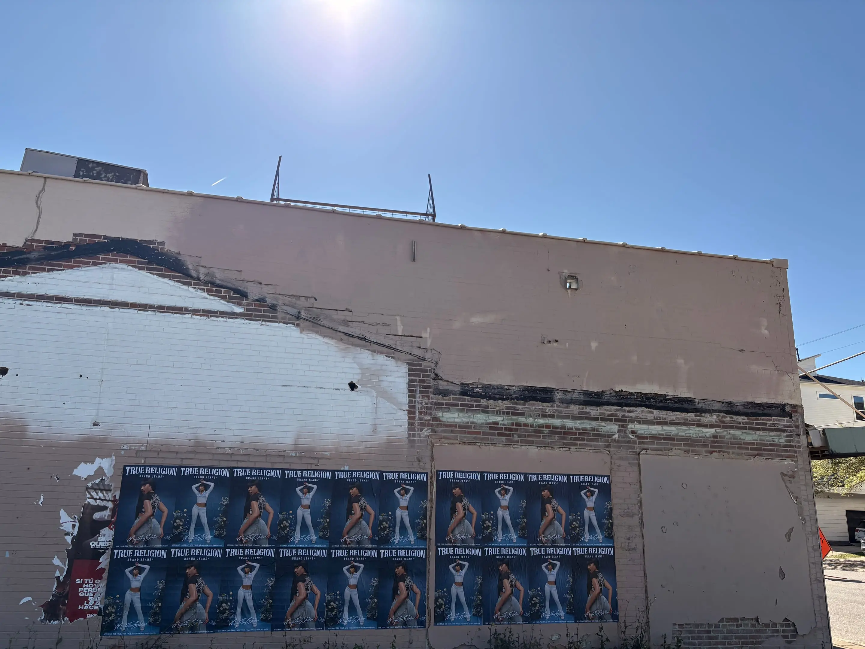 True Religion brand jeans wheatpaste poster campaign in Houston, TX by Beyond Street Media