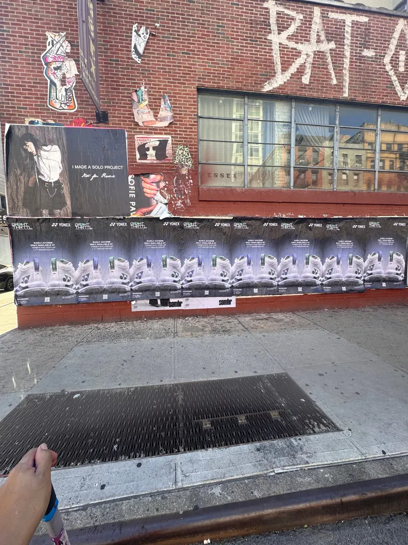 Yonex Pop-Up sidewalk stencil at 117 Wooster St, SoHo NYC - neon-green spray stencil by Beyond Street Media (photo 10 of 28).