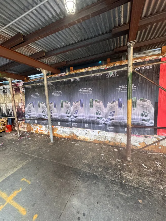 Yonex Pop-Up sidewalk stencil at 117 Wooster St, SoHo NYC - neon-green spray stencil by Beyond Street Media (photo 12 of 28).