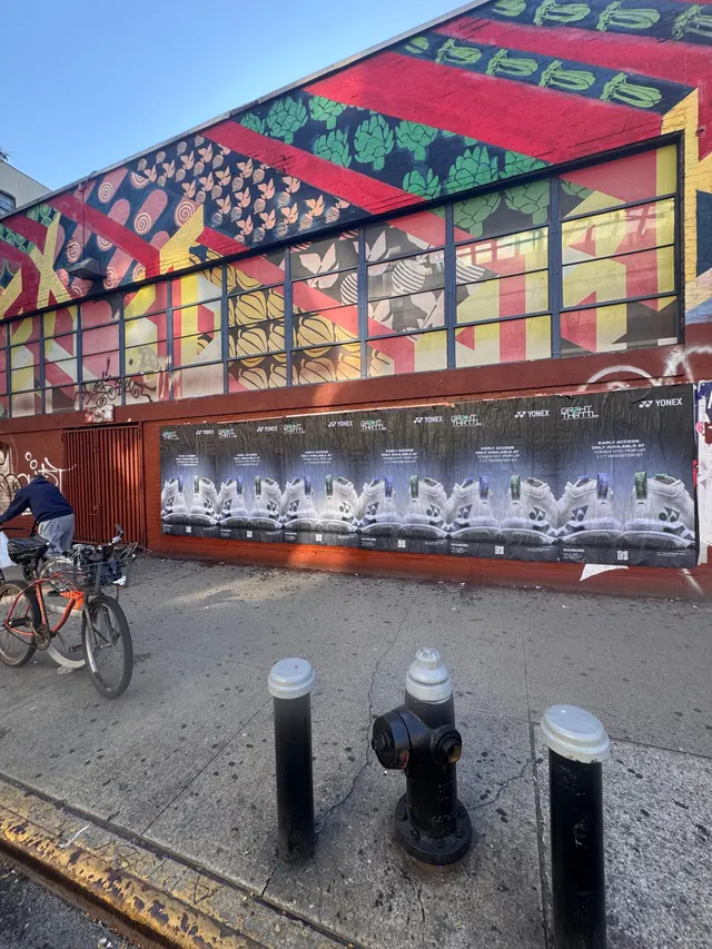 Yonex Pop-Up sidewalk stencil at 117 Wooster St, SoHo NYC - neon-green spray stencil by Beyond Street Media (photo 17 of 28).